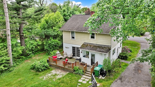 8 Townsend Blvd, Poughkeepsie, NY 12603 - rear view of house with a wooden deck, a lawn, and roof with shingles
