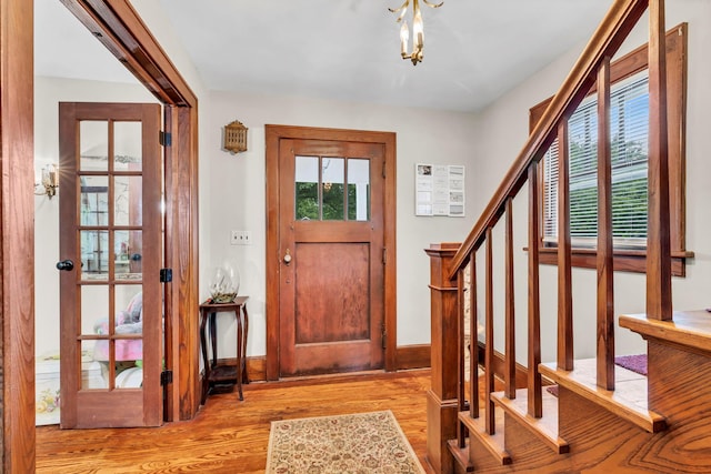 8 Townsend Blvd, Poughkeepsie, NY 12603 - entryway with light wood finished floors, stairs, and baseboards