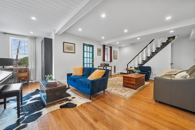 1219 Maple Ave, Peekskill, NY 10566 - living area featuring light wood-type flooring, beamed ceiling, stairs, recessed lighting, and a baseboard heating unit