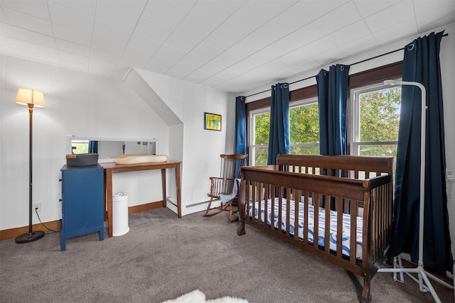 1219 Maple Ave, Peekskill, NY 10566 - carpeted bedroom featuring a baseboard heating unit and baseboards