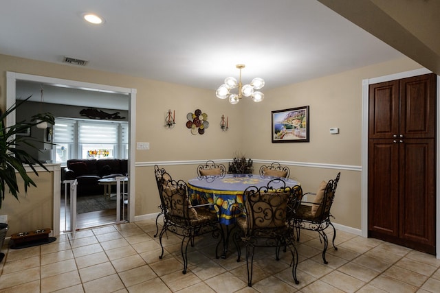 11 Crescent St, Mastic, NY 11950 - dining room with light tile patterned floors, a chandelier, baseboards, and recessed lighting