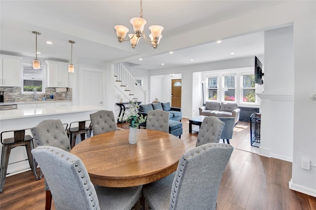 26 Alta Dr, Mount Vernon, NY 10552 - dining space with stairway, recessed lighting, a chandelier, baseboards, and dark wood finished floors