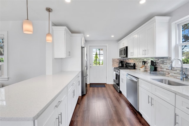 26 Alta Dr, Mount Vernon, NY 10552 - kitchen featuring stainless steel appliances, a sink, recessed lighting, tasteful backsplash, and dark wood finished floors