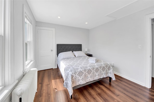 26 Alta Dr, Mount Vernon, NY 10552 - bedroom with radiator, dark wood-type flooring, multiple windows, baseboards, and recessed lighting