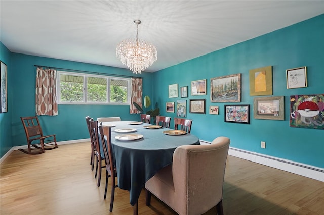 5 Fairgreen Ct, Cortlandt Manor, NY 10567 - dining room featuring a chandelier, wood finished floors, baseboards, and baseboard heating
