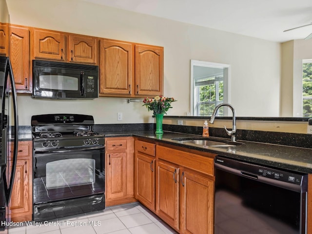 212 Commons Ln, Saugerties, NY 12477 - kitchen featuring black appliances, a sink, healthy amount of natural light, and brown cabinets