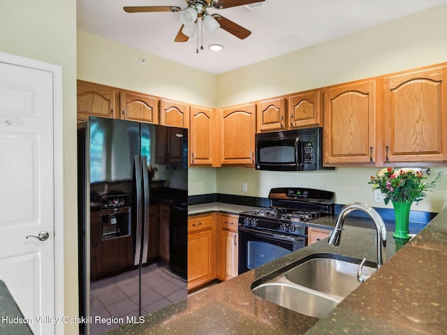 212 Commons Ln, Saugerties, NY 12477 - kitchen with black appliances, a sink, ceiling fan, dark stone countertops, and recessed lighting