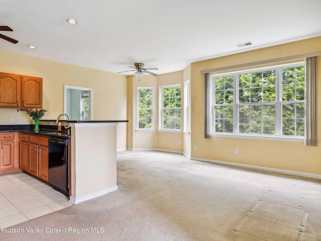 212 Commons Ln, Saugerties, NY 12477 - kitchen featuring ceiling fan, dishwasher, a sink, baseboards, and light carpet