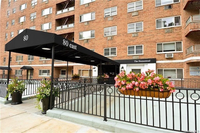 80 E Hartsdale Ave Unit 520, Hartsdale, NY 10530 - gate featuring fence and a wall unit AC