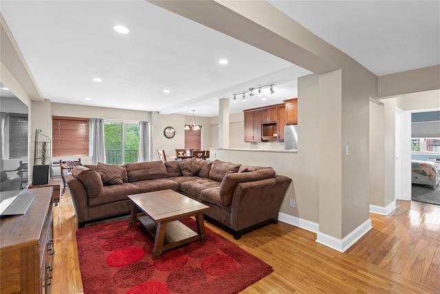 80 E Hartsdale Ave Unit 520, Hartsdale, NY 10530 - living room featuring light wood-style floors, baseboards, and recessed lighting