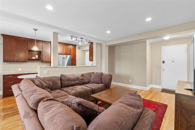 80 E Hartsdale Ave Unit 520, Hartsdale, NY 10530 - living room featuring light wood finished floors, baseboards, and recessed lighting
