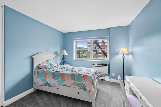 80 E Hartsdale Ave Unit 520, Hartsdale, NY 10530 - bedroom featuring dark colored carpet, baseboards, a wall mounted AC, and baseboard heating