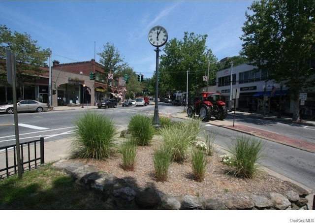 80 E Hartsdale Ave Unit 520, Hartsdale, NY 10530 - view of asphalt street featuring sidewalks, curbs, and street lighting