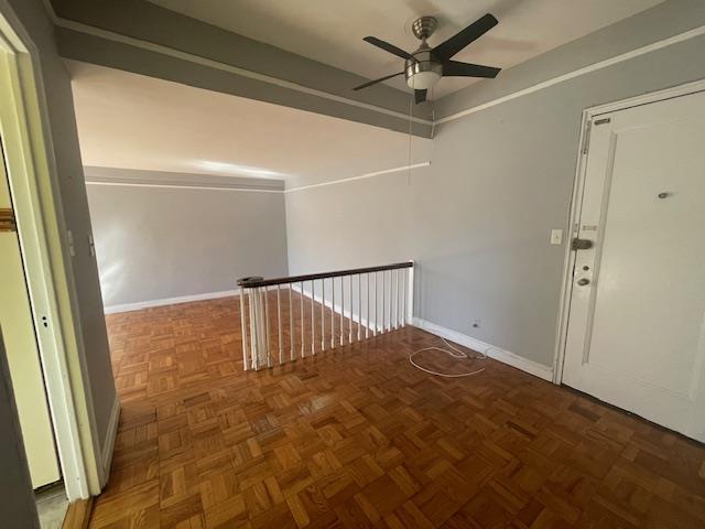 230 Central Ave Unit 2-H, Lawrence, NY 11559 - unfurnished room with ceiling fan and baseboards