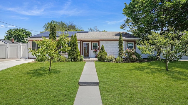 871 Val Park Ave, Valley Stream, NY 11580 - view of front of property featuring roof mounted solar panels