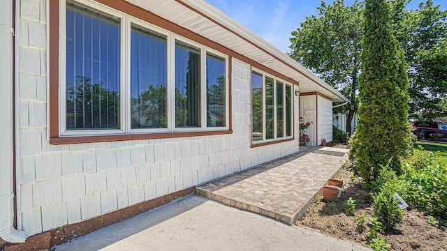 871 Val Park Ave, Valley Stream, NY 11580 - view of home's exterior with a patio area