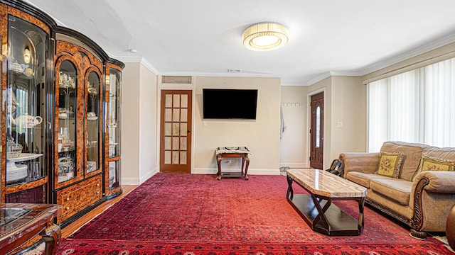 871 Val Park Ave, Valley Stream, NY 11580 - living room featuring crown molding and baseboards