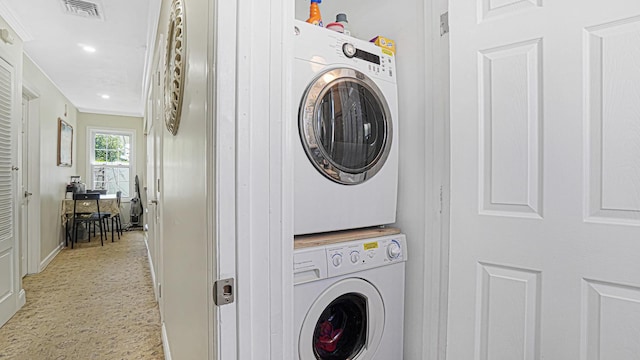 871 Val Park Ave, Valley Stream, NY 11580 - laundry room featuring stacked washing machine and dryer, baseboards, light flooring, and recessed lighting