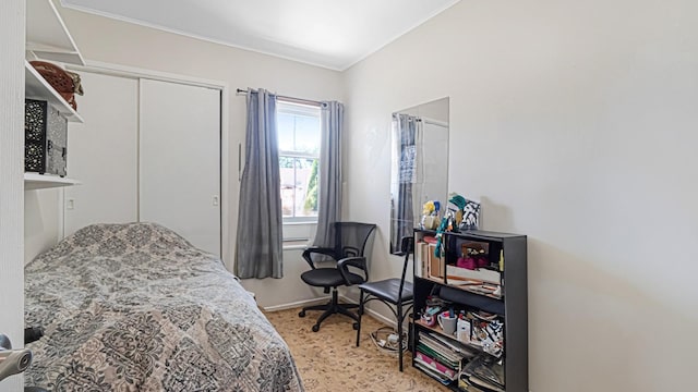 871 Val Park Ave, Valley Stream, NY 11580 - bedroom featuring a closet, baseboards, and light colored carpet