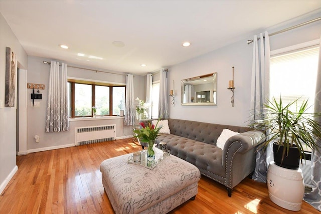 186 E Chester St, Valley Stream, NY 11580 - living room with radiator, hardwood / wood-style floors, baseboards, and recessed lighting