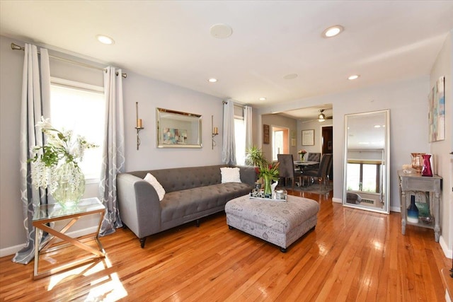 186 E Chester St, Valley Stream, NY 11580 - living area with light wood-style flooring, plenty of natural light, recessed lighting, ceiling fan, and baseboards