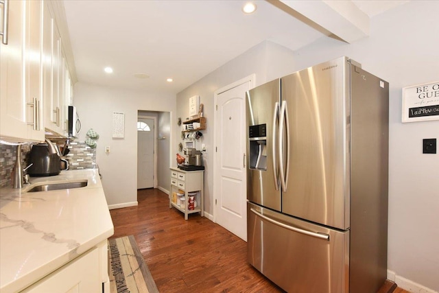 186 E Chester St, Valley Stream, NY 11580 - kitchen featuring stainless steel appliances, white cabinetry, recessed lighting, dark wood-style floors, and tasteful backsplash