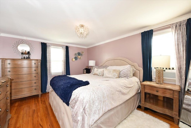 186 E Chester St, Valley Stream, NY 11580 - bedroom with wood finished floors and ornamental molding