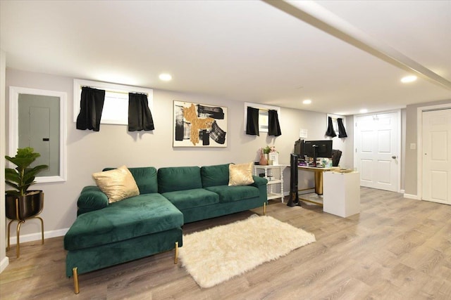 186 E Chester St, Valley Stream, NY 11580 - living area with light wood-style floors, baseboards, and recessed lighting