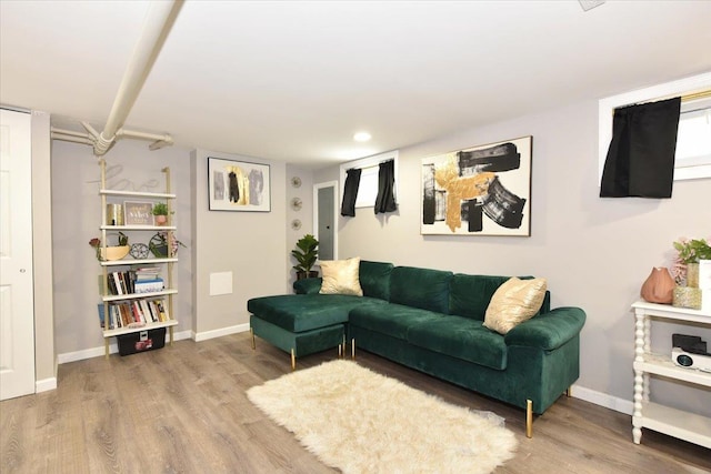 186 E Chester St, Valley Stream, NY 11580 - living room with wood finished floors, baseboards, and recessed lighting