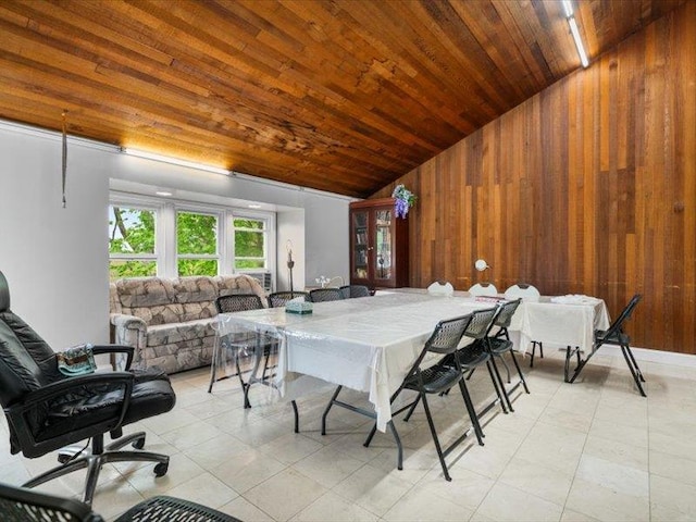 36 Starr Ave, Monticello, NY 12701 - dining area featuring wooden ceiling, wooden walls, light tile patterned flooring, and high vaulted ceiling