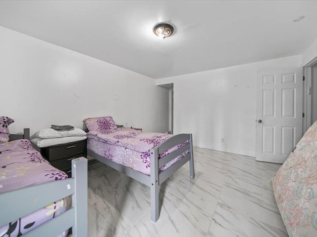 36 Starr Ave, Monticello, NY 12701 - bedroom featuring marble look tile flooring