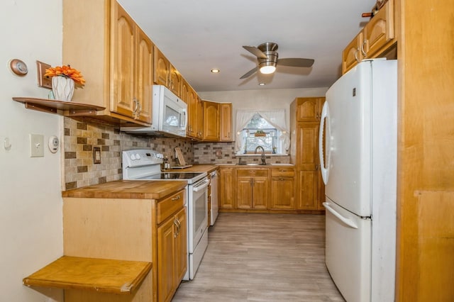 722 Shenandoah Ave, Peekskill, NY 10566 - kitchen featuring white appliances, a sink, a ceiling fan, decorative backsplash, and recessed lighting