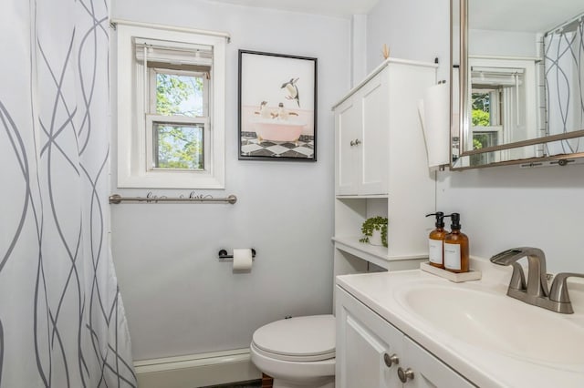 722 Shenandoah Ave, Peekskill, NY 10566 - full bathroom featuring a baseboard radiator, healthy amount of natural light, toilet, and vanity