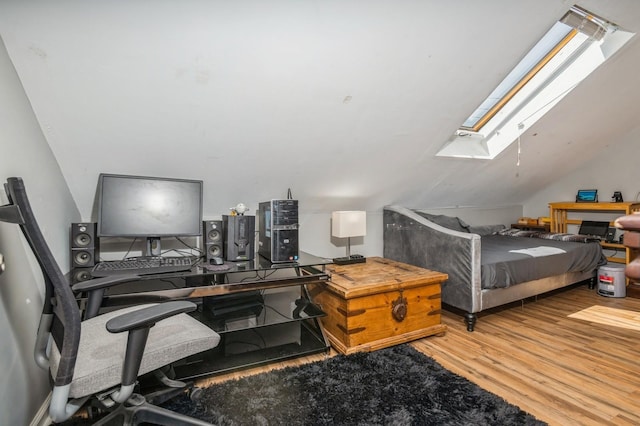 722 Shenandoah Ave, Peekskill, NY 10566 - bedroom featuring a skylight, wood finished floors, and lofted ceiling