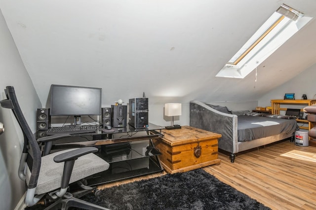 722 Shenandoah Ave, Peekskill, NY 10566 - bedroom with a skylight, wood finished floors, and lofted ceiling