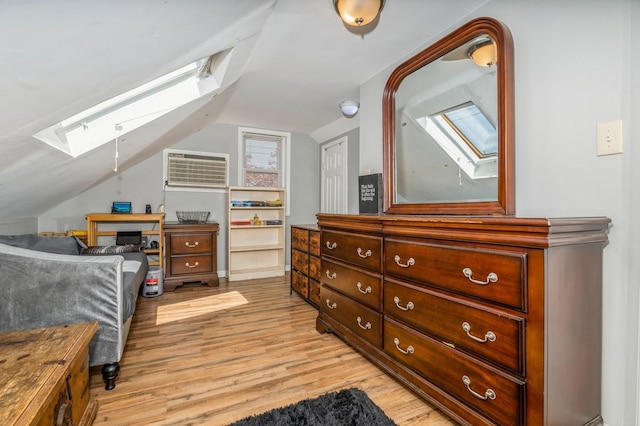 722 Shenandoah Ave, Peekskill, NY 10566 - bedroom with a skylight, light wood-style floors, vaulted ceiling, and multiple windows