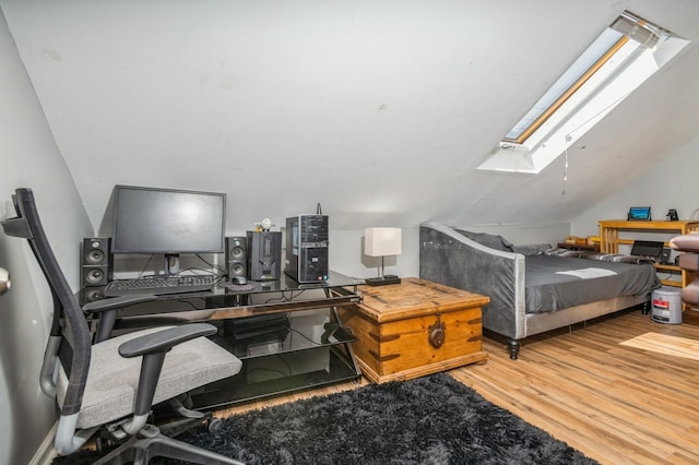 722 Shenandoah Ave, Peekskill, NY 10566 - bedroom featuring a skylight, wood finished floors, lofted ceiling, and an office area