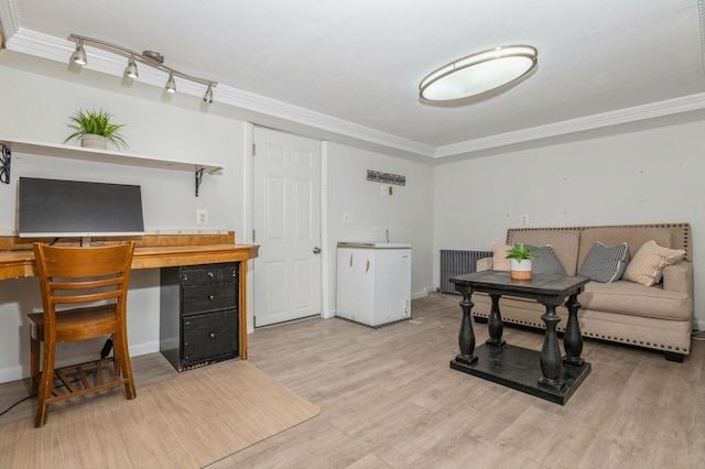 722 Shenandoah Ave, Peekskill, NY 10566 - office space featuring light wood-type flooring, crown molding, baseboards, and radiator heating unit