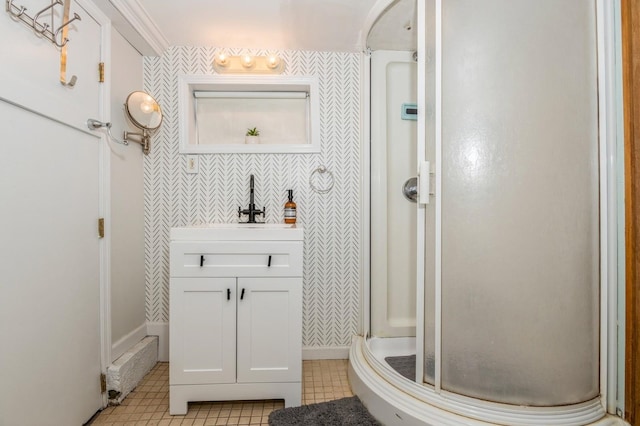 722 Shenandoah Ave, Peekskill, NY 10566 - bathroom featuring a stall shower, vanity, tile patterned flooring, wallpapered walls, and baseboards