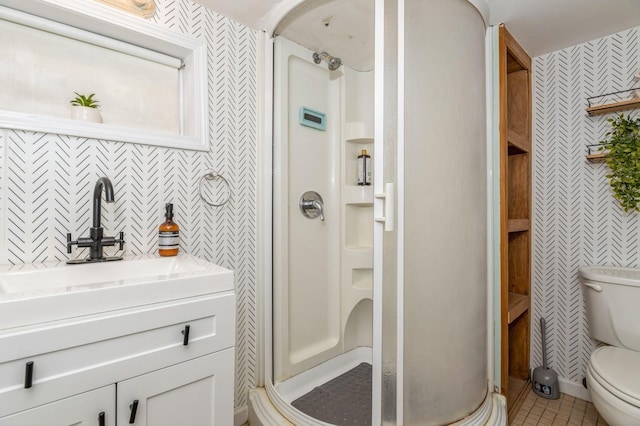722 Shenandoah Ave, Peekskill, NY 10566 - bathroom with a shower stall, toilet, vanity, tile patterned floors, and tile walls