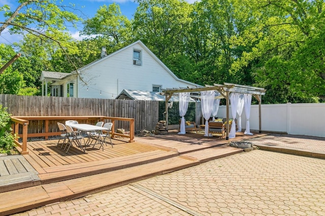 722 Shenandoah Ave, Peekskill, NY 10566 - view of patio / terrace featuring a pergola, outdoor dining space, a wooden deck, and a fenced backyard