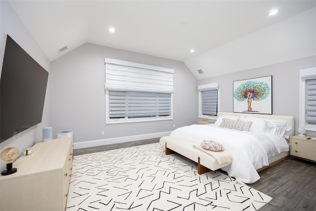 18 Heron Ct, Levittown, NY 11756 - bedroom with vaulted ceiling, wood finished floors, baseboards, and recessed lighting
