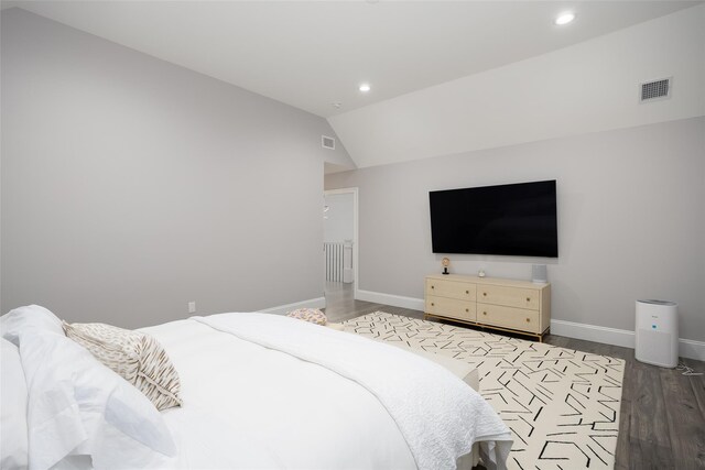 18 Heron Ct, Levittown, NY 11756 - bedroom featuring wood finished floors, recessed lighting, baseboards, and lofted ceiling