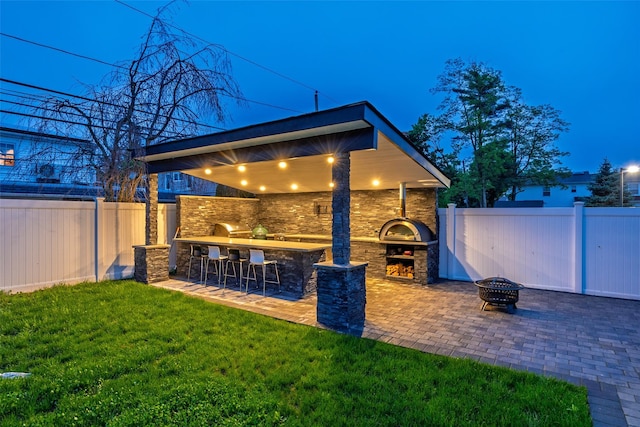 18 Heron Ct, Levittown, NY 11756 - view of yard with a fire pit and a patio area
