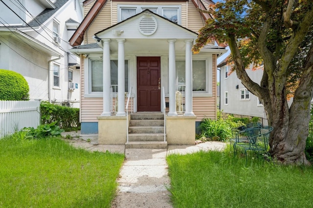 435 S Columbus Ave, Mount Vernon, NY 10553 - view of front facade with fence and covered porch