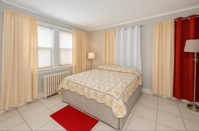 435 S Columbus Ave, Mount Vernon, NY 10553 - bedroom with radiator, light tile patterned floors, crown molding, and baseboards