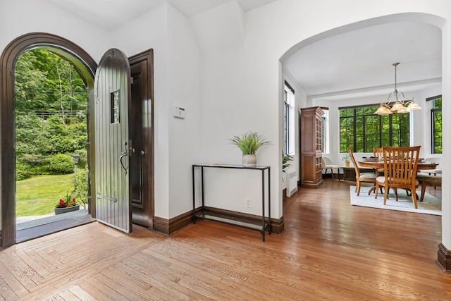 100 Mount Airy Rd S, Croton-On-Hudson, NY 10520 - entryway featuring arched walkways, healthy amount of natural light, and light wood-style flooring