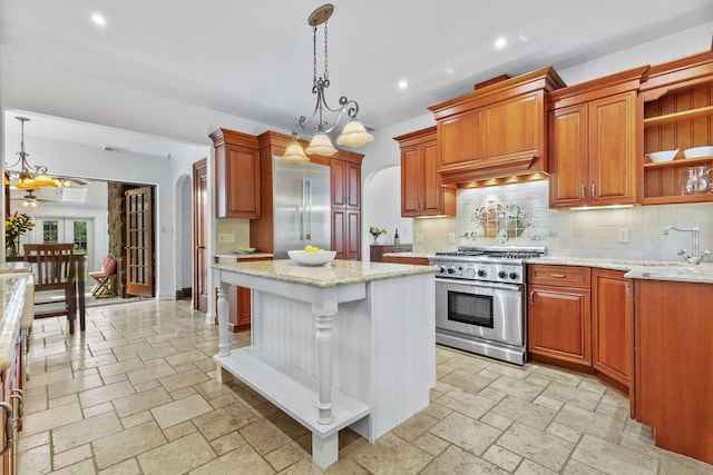 100 Mount Airy Rd S, Croton-On-Hudson, NY 10520 - kitchen with high quality appliances, a chandelier, a sink, recessed lighting, and stone tile flooring