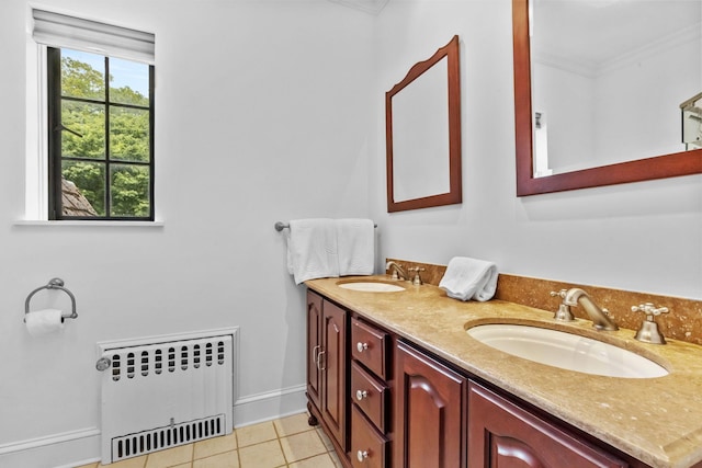 100 Mount Airy Rd S, Croton-On-Hudson, NY 10520 - bathroom with radiator, ornamental molding, double vanity, tile patterned floors, and baseboards