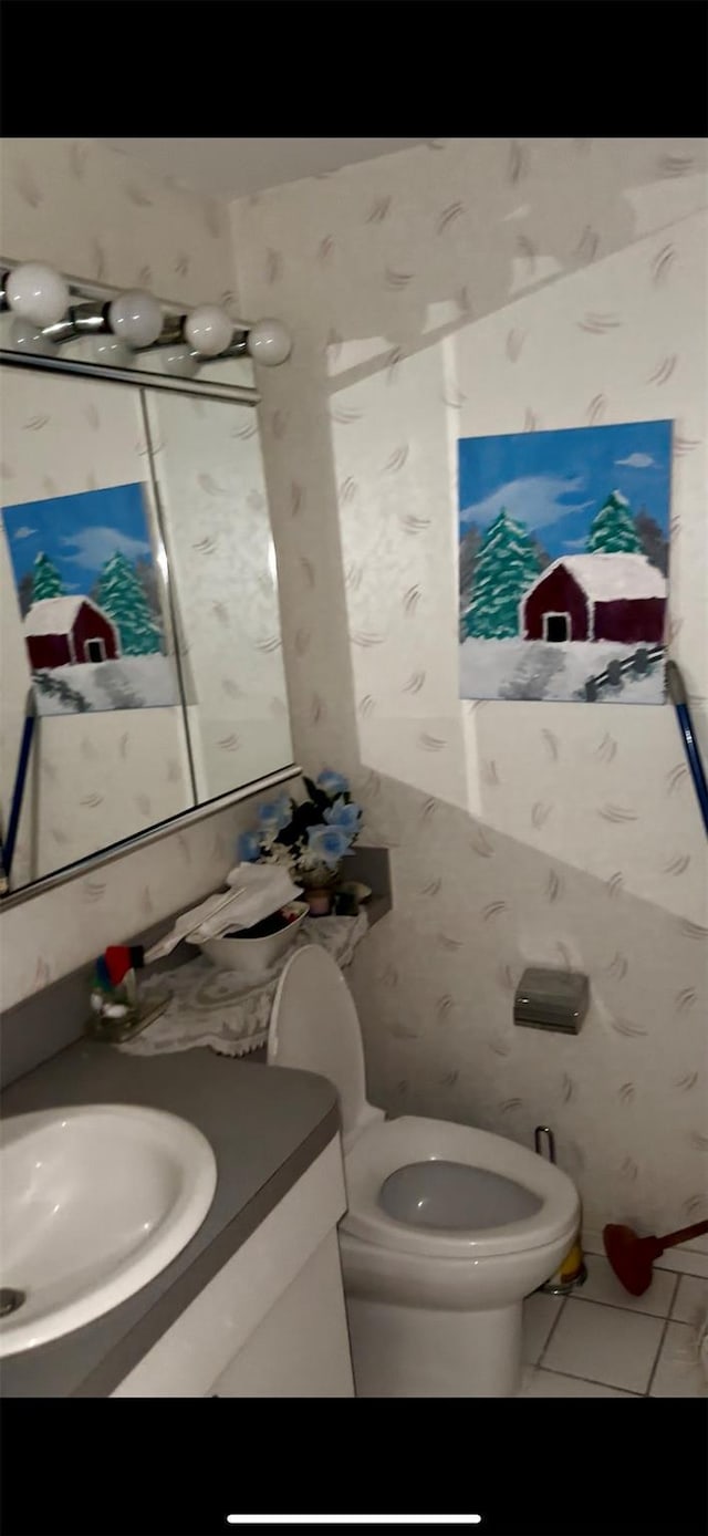 10 Ipswich Ave Unit 4M, Great Neck, NY 11021 - bathroom with toilet, vanity, and tile patterned floors